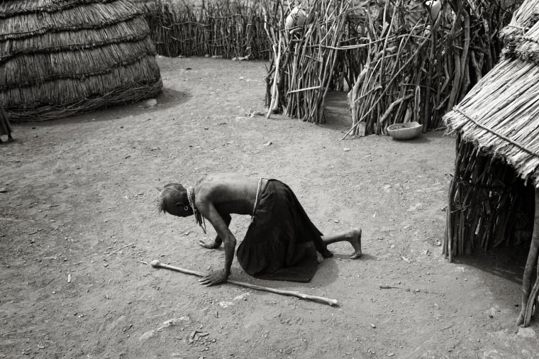 Nakangae village, North Turkana, 19 July 2011

An elederly woman too weak to stand on her feet after days without food or water.
It?s been over a year since it last rained in the area. Children and the elderly are suffering the worst consequences of the drought.