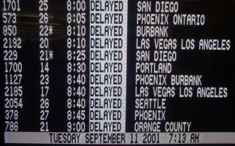 Delayed Southwest flights are seen on a television monitor  Tuesday, Sept. 11, 2001,  at the Oakland International Airport in Oakland, Calif. All flights in the country regulated by the FAA have ben cancelled after attacks in New York and Washington.. (AP Photo/Ben Margot)