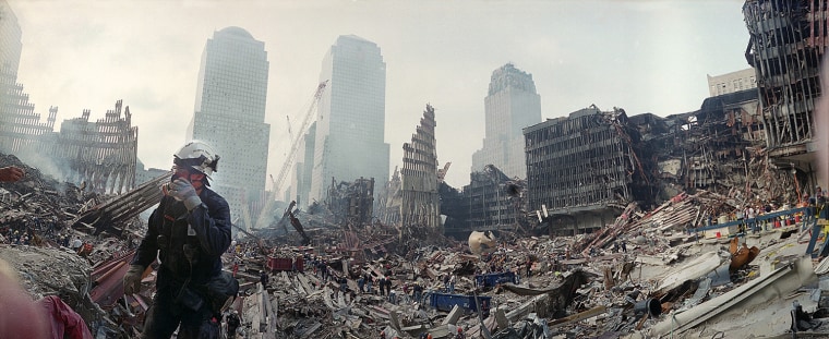 RESCUE WORKERS CONTINUE EFFORTS AROUND WORLD TRADE CENTER