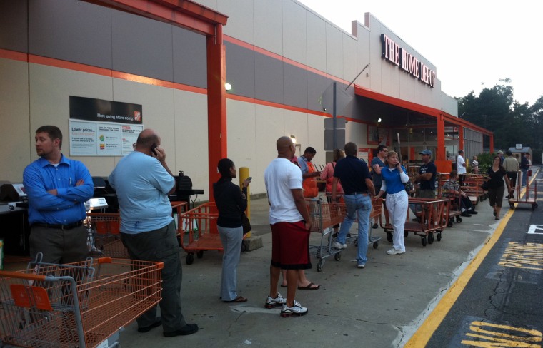 Image: Customers line up outside a Home Depot in Springfield, NJ for generators.