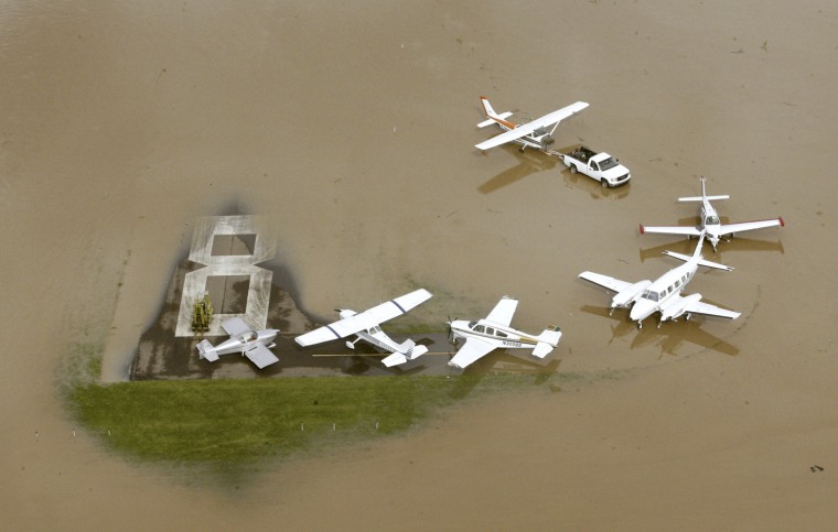 Image: Airplanes sit at the flooded Bloomsburg Airport, in Bloomsburg, Pa.