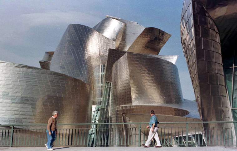 **  Fille  ** The Guggenheim Museum, designed by California architect Frank Gehry, is seen in this Oct. 18, 1997 file photo in Bilbao, Spain before its official opening. The $100 million building, funded by the Basque regional government, constructed of titanium, limestone and glass, celebrates its 10-year anniversary in Oct. 2007. The museum was inaugurated Oct. 18, 1997 and open to the public a day later. (AP Photo/Santiago Lyon, Files)