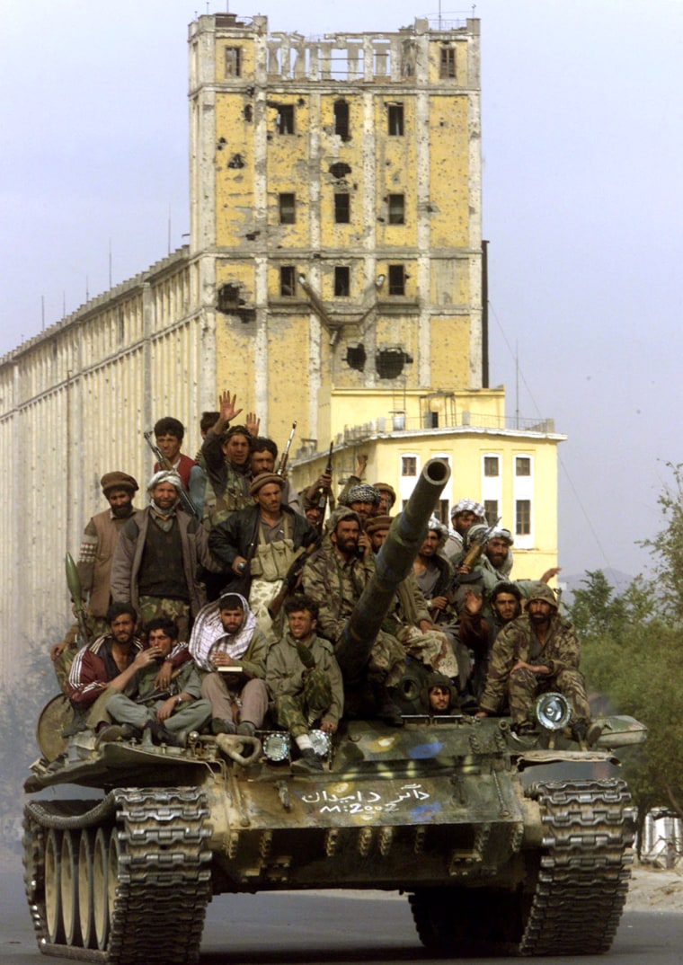NORTHERN ALLIANCE TROOPS ENTER KABUL ON A TANK