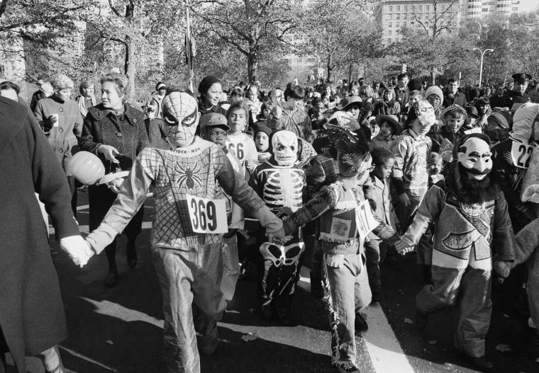 Youngsters parade through Central Park in New York dressed in their Halloween costumers when the city arranged a party for the kids Oct. 30, 1966. Some 20,000 kids attended the party in the Park. (AP Photo/Jacob Harris)