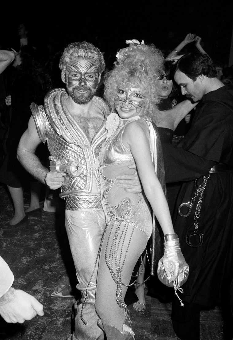 Halloween revelers at New York's Studio 54 dance the night away in costumes ranging from burlesque to stellar. The party was held at the New York Discoteque Oct. 31, 1977. (AP Photo/Richard Drew)