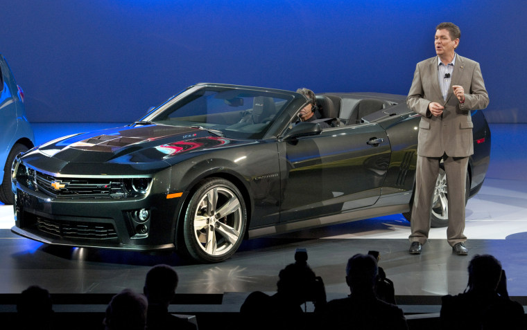 Image: Chevrolet Vice President Global Marketing and Strategy Chris Perry reacts as the 2013 Chevrolet Camaro ZL1 Convertible is unveiled at the Los Angeles International Auto Show