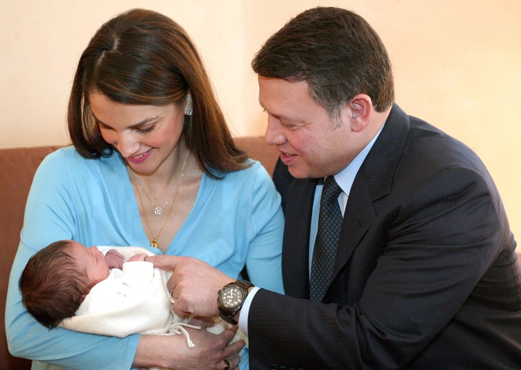 In this picture released by the Royal Palace, Jordan's King Abdullah II, right, and Jordan's Queen Rania, left,  are seen with their newly born son Prince Hashem in Amman, Jordan, Monday Jan. 31, 2005.  Jordan's queen gave birth to a boy her fourth child on Sunday, Jan. 30, coinciding with the 43rd birthday of the baby's father, King Abdullah II, the Royal Palace announced.   (AP Photo/Yussef Allan, Royal Palace)