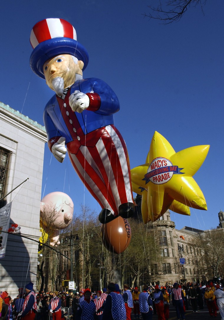 The \"Uncle Sam\" balloon leads off the Macy's Thank