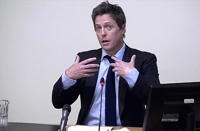 Image: A still image from broadcast footage shows actor Hugh Grant speaking at the Leveson Inquiry at the High Court in central London