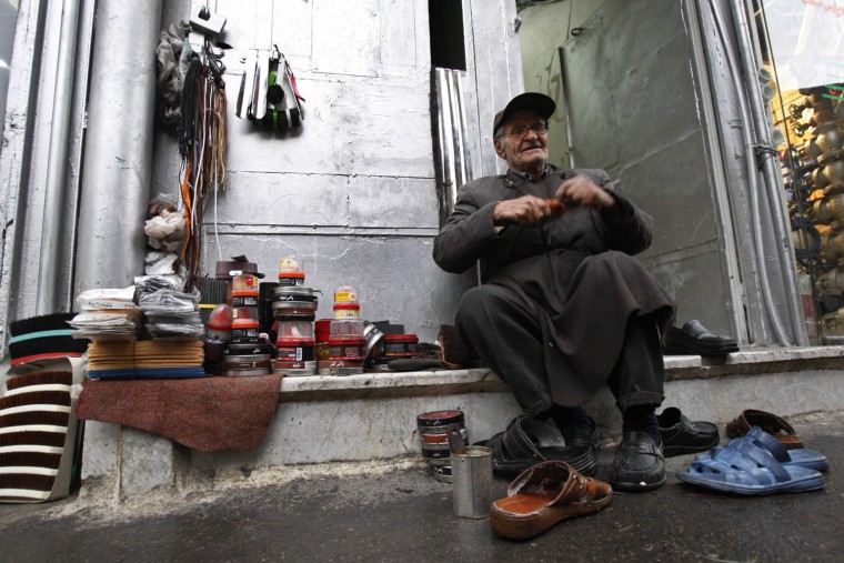 Image: Shoe repairman in Tehran, Iran