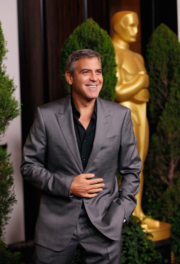 Image: Actor George Clooney, best actor nominee for his role in \"The Descendants\", arrives at the 84th Academy Awards nominees luncheon in Beverly Hills