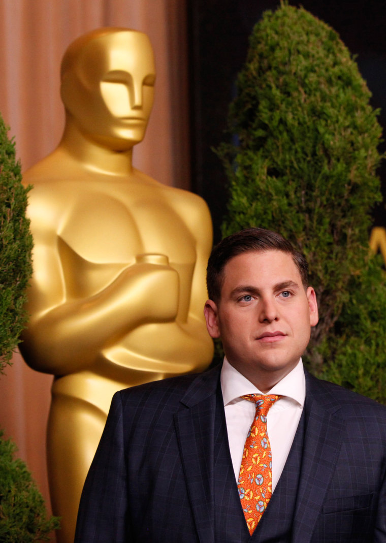 Image: Actor Jonah Hill, best supporting actor nominee for his role in \"Moneyball\" ,arrives at the 84th Academy Awards nominees luncheon