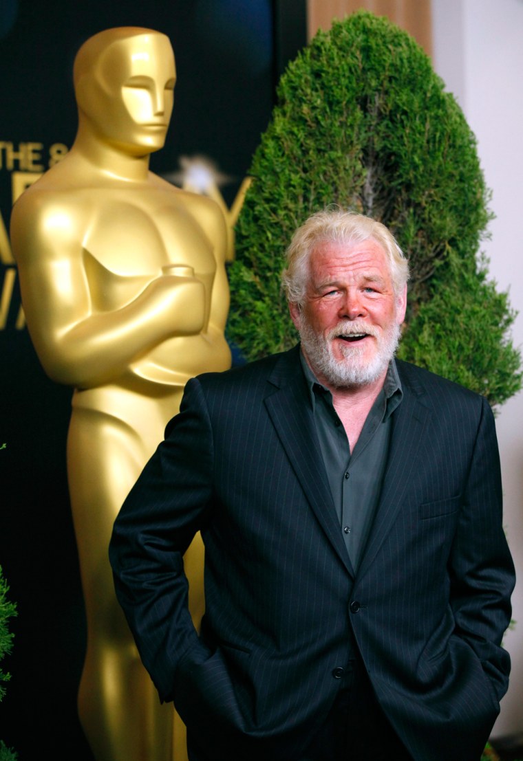 Image: Actor Nick Nolte, nominated for best supporting actor for his role in \"Warrior\", arrives at the 84th Academy Awards nominees luncheon in Beverly Hills