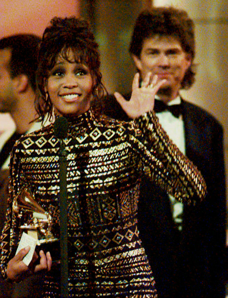 Whitney Houston waves to the crowd at the 36th Ann