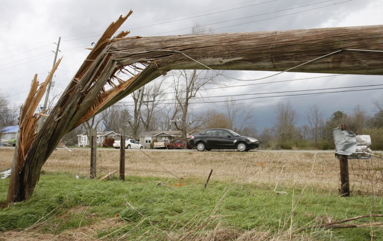 Image: A power pole blown over by a tornado in New Market, AL