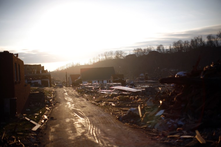 Image: Buildings damaged by a chain of tornadoes are seen in West Liberty, Kentucky
