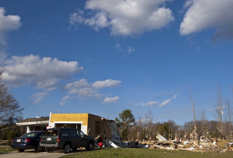 Image: Debris is seen from the Stevens' home that was demolished by a twister in Charlotte