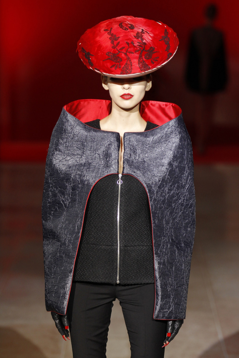 Image: A model presents a creation by Portuguese designer Fatima Lopes as part of her Fall/Winter 2012-2013 women's  ready-to-wear fashion show during Paris fashion week