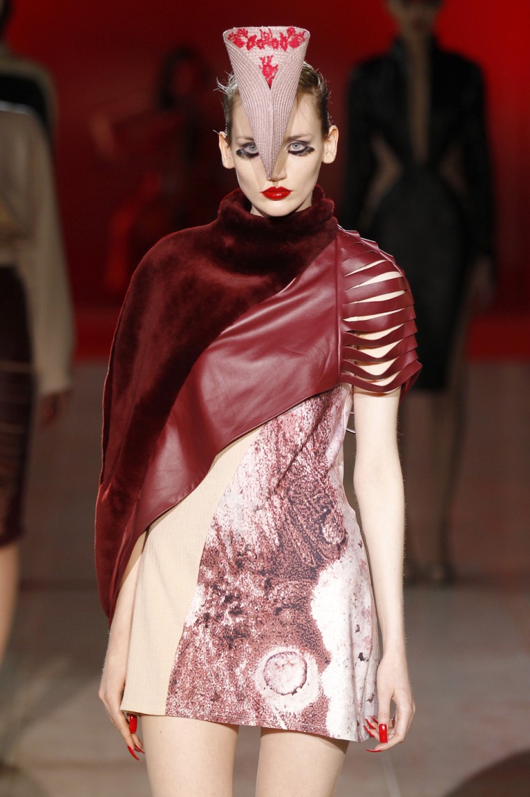 Image: A model presents a creation by Portuguese designer Fatima Lopes as part of her Fall/Winter 2012-2013 women's  ready-to-wear fashion show during Paris fashion week