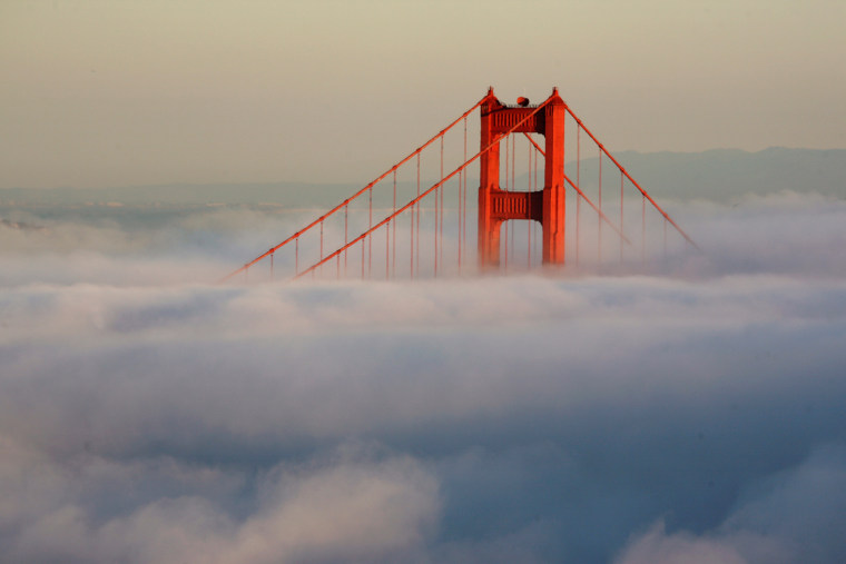 Image: South Tower of Golden Gate Bridge emerges from fog from Marin Headlands