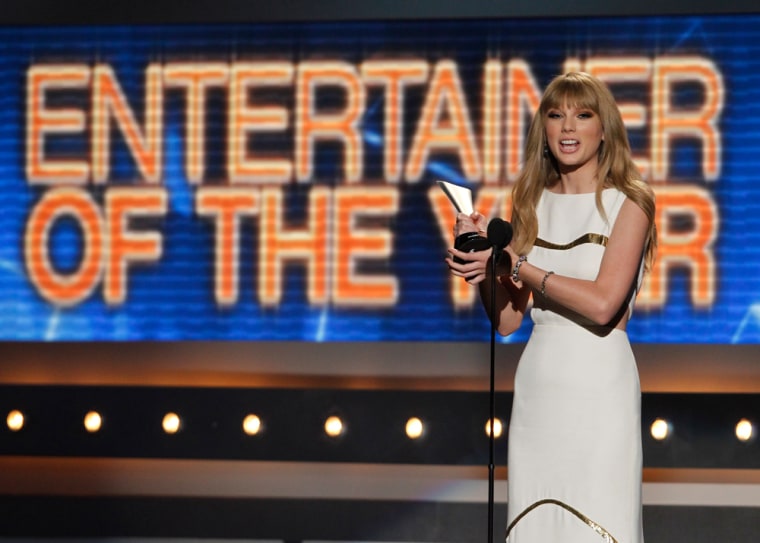Image: Taylor Swift accepts the award for entertainer of the year at the 47th annual Academy of Country Music Awards in Las Vegas