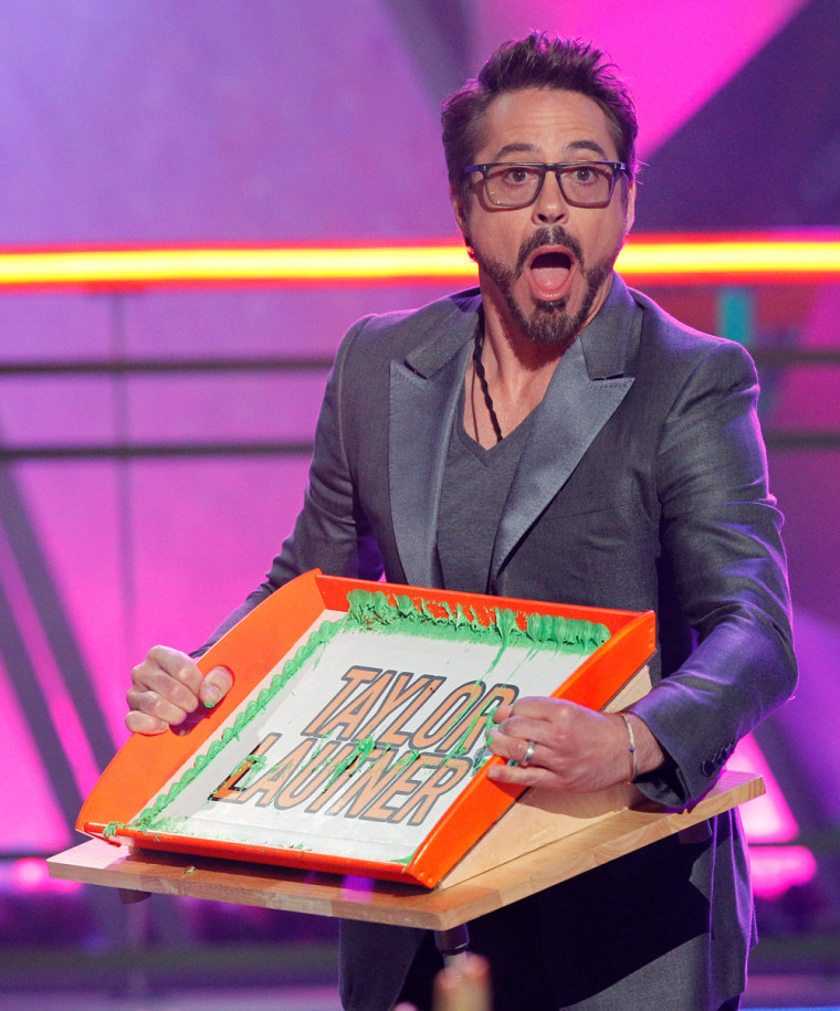 Image: Actor Downey Jr. announces the Favorite Buttkicker award at Nickelodeon's 25th annual Kids' Choice Awards in Los Angeles