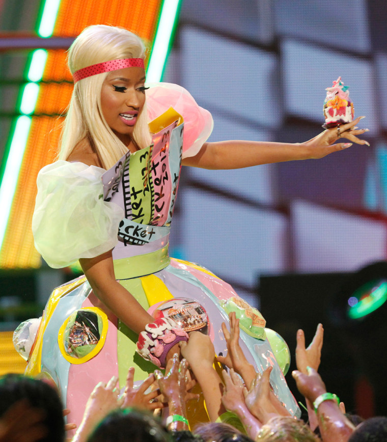 Image: Singer Nicki Minaj greets fans on stage at Nickelodeon's 25th annual Kids' Choice Awards in Los Angeles