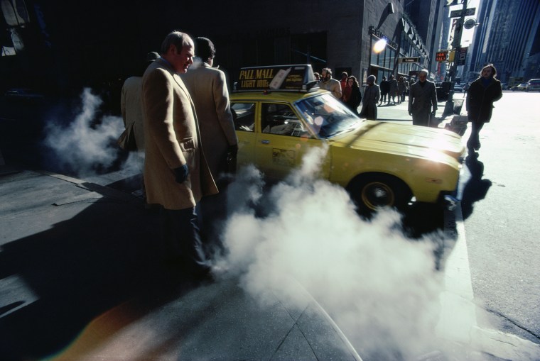 Steam rises from the sidewalk in New York City, February 1980.