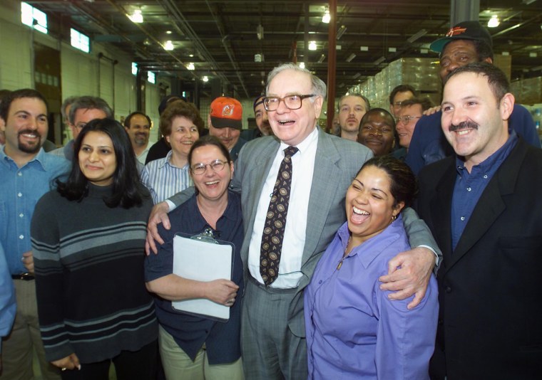 Warren Buffett tours Benjamin Moore facilities