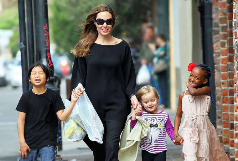 Angelina Jolie takes her kids Pax Thien, Vivienne Jolie-Pitt, and Zahara to the corner store in New Orleans, LA