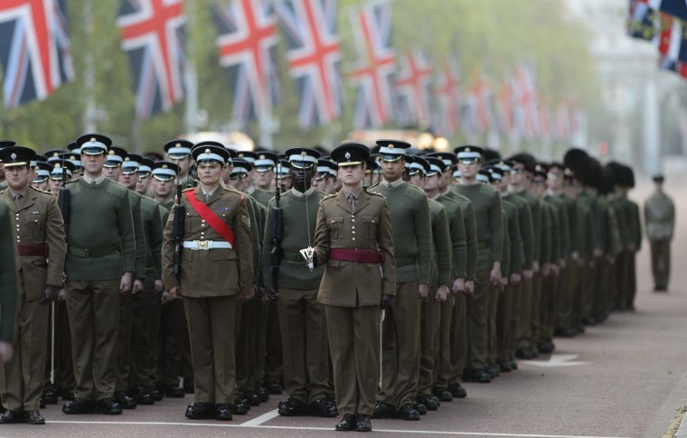 Image: Soldiers stage a full dress rehearsal of