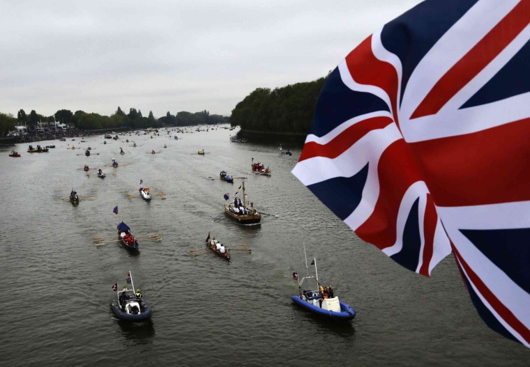 Image: Pleasure boats muster on the River Thames, in celebration of the Queen's Diamond Jubilee, in London