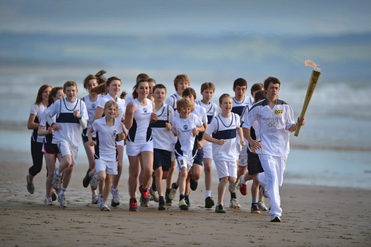 Image: The Olympic Torch Continues Its Journey Around The UK
