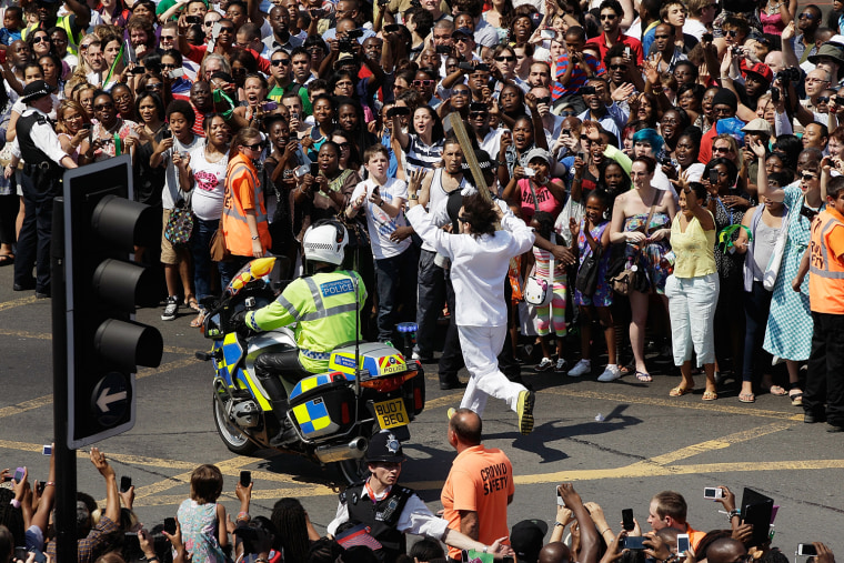 Image: After 68 Days Travelling Around The UK The Olympic Torch Reaches Central London Ahead Of The Opening Ceremony