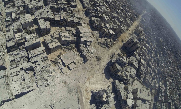 Image: Aerial view shows the destruction in the Khalidiya district of Homs
