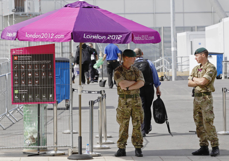 Image: Soldiers man a security checkpoint at an entrance to the London 2012 Olympic Park at Stratford in London