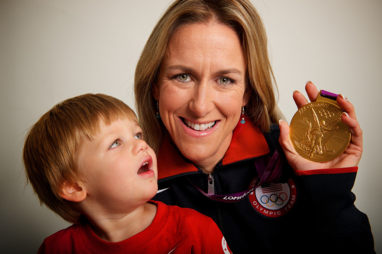 2012 Neil Leifer -- USA cycling gold medalist Kristin Armstrong poses with her son Lucas, 22 months, for a portrait by Neil Leifer during the 2012 Olympics in London, UK on August 2, 2012.