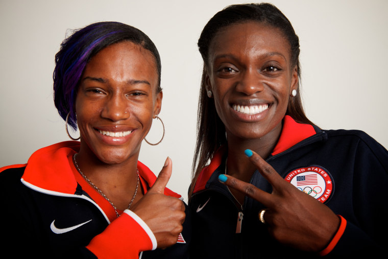 Neil Leifer -- USA hurdlers Kellie Wells (bronze, left) Dawn Harper (silver, right) pose for a portrait by Neil Leifer during the 2012 Olympics in London, UK on August 8, 2012.
