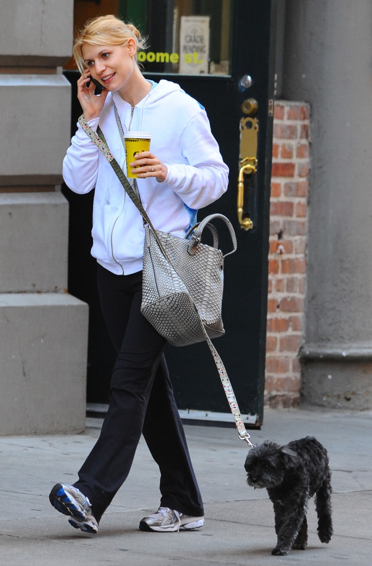 Claire Danes walks her Schnoodle, \"Weegee\" to a coffee shop in Soho.