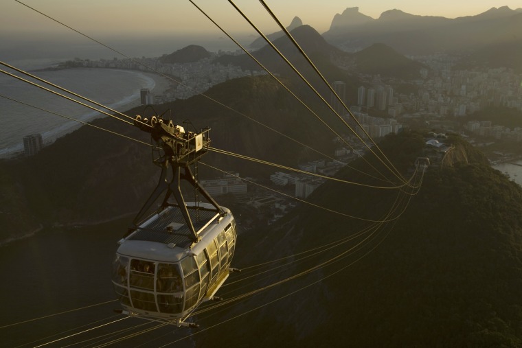 Image: Cable car travels to and from Sugar Loaf mountain in Rio de Janeiro