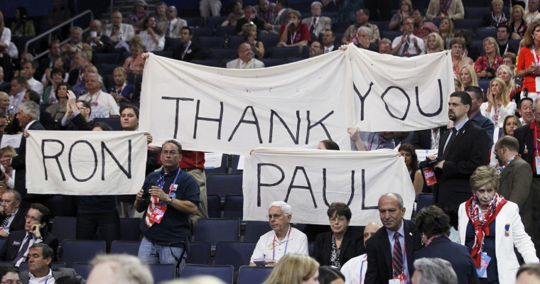 Image: Ron Paul supporters display sign during third session of the Republican National Convention in Tampa