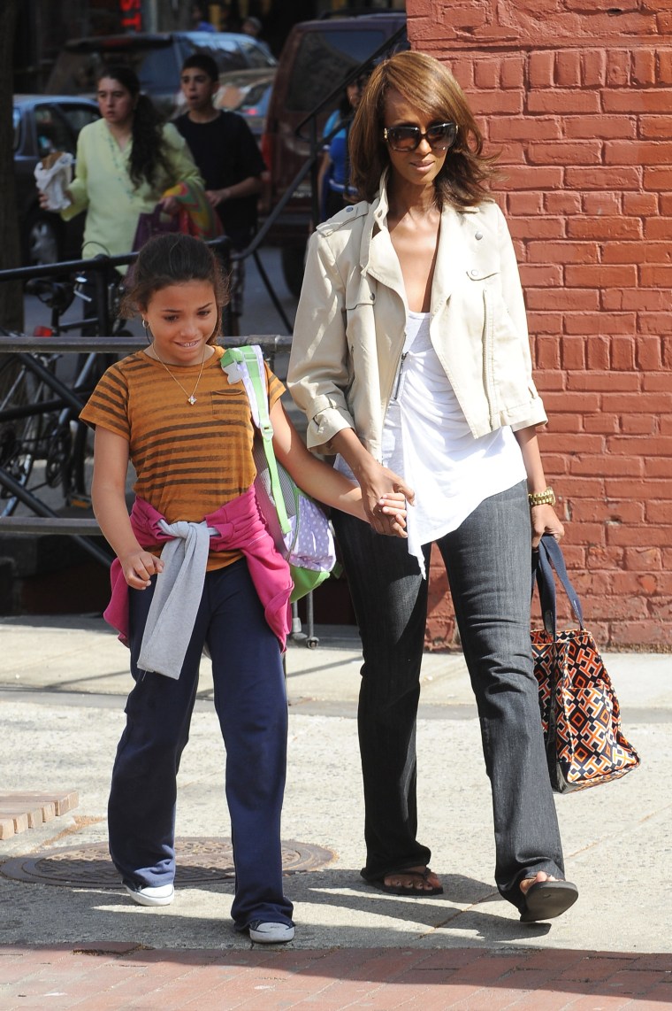 Iman picks up her daughter, Alexandria Zahra Jones, from school in the West Village.