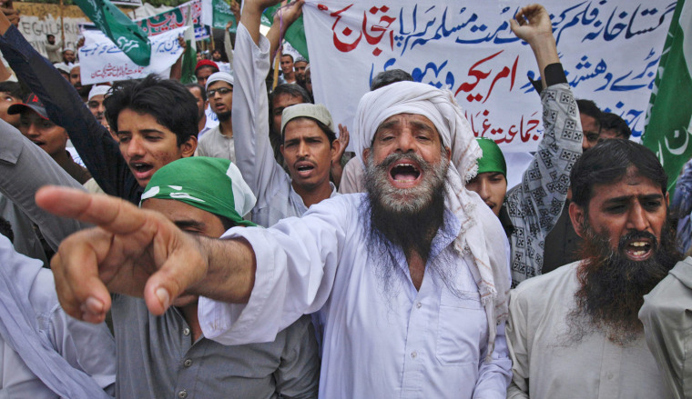 Image: Supporters of the religious political party Markazi Jamiat Ahlehadith Pakistan shout slogans during protest against anti-Islam film made in the U.S. mocking Prophet Mohammad, in Karachi