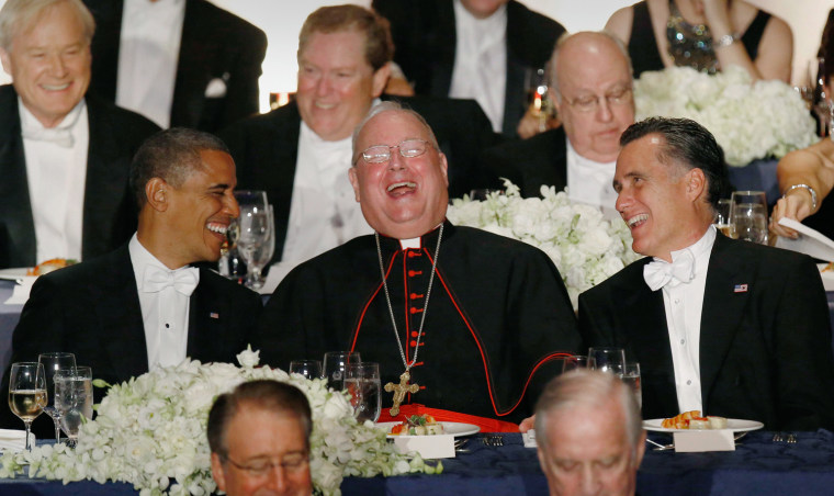 Image: U.S. President Obama and Republican presidential candidate Romney share a laugh with Cardinal Dolan at the 67th Annual Alfred E. Smith Memorial Foundation dinner in New York