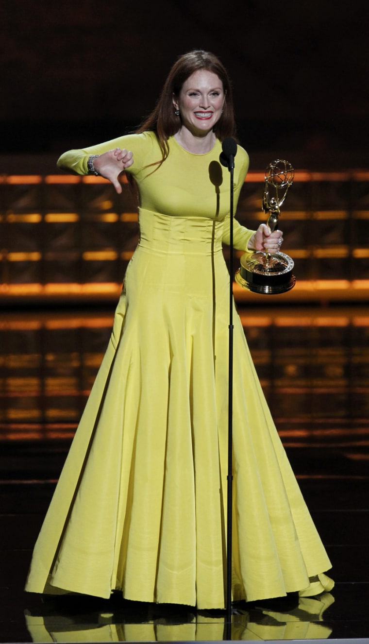 Image: Julianne Moore gives a thumbs down sign after winning the award for outstanding lead actress in a miniseries or movie at the 64th Primetime Emmy Awards in Los Angeles