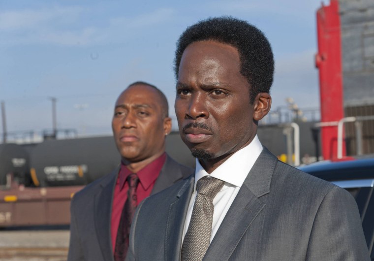 SONS OF ANARCHY Sovereign -- Episode 501 (Season Premiere, Tuesday, September 11, 10:00 pm e/p) -- Pictured: (L-R): Derek Anthony as Goodman, Harold Perrineau as Damon Pope