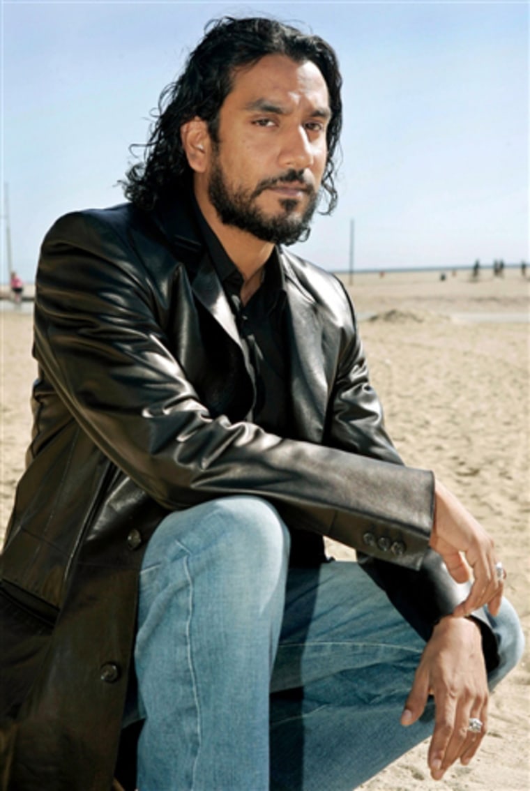 Actor Naveen Andrews, who stars in the ABC series \"Lost,\" poses on Santa Monica beach Wednesday, March 15, 2006, in Santa Monica, Calif. (AP Photo/Ric Francis)