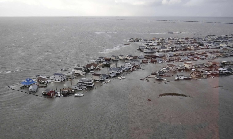 Image: U.S. Coast Guard handout photo of homes flooded after Hurricane Sandy made landfall on the southern New Jersey coastline