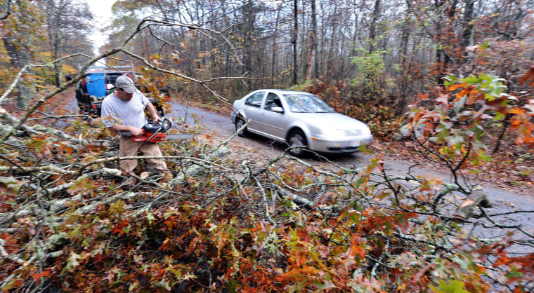 Image: Massive storm slams US, leaving 16 dead and millions in the dark