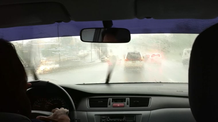 Friday, Oct 26. Heavy rains, wind, lots of lightning pelted the city as we drove down a highway in Santo Domingo.